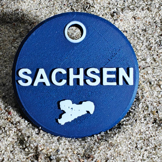 Vorderseite des TEGs 71-13 - Bundesland Sachsen 2026 im Sand