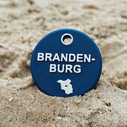 Vorderseite des TEGs 71-4 - Bundesland Brandenburg 2026 im Sand