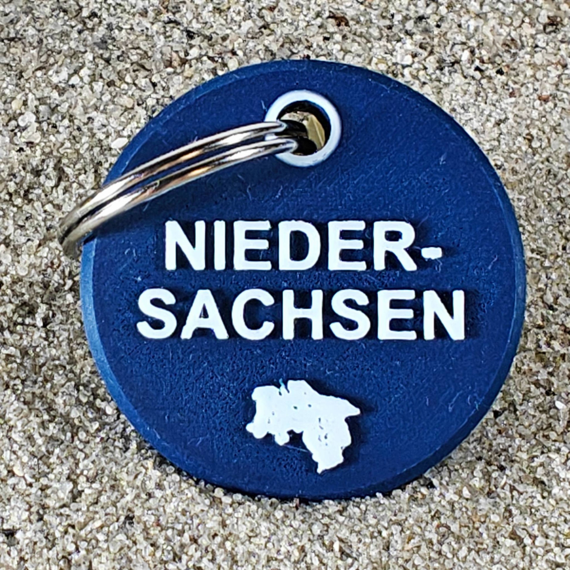 Vorderseite des TEGs 71-9 - Bundesland Niedersachsen 2026 im Sand